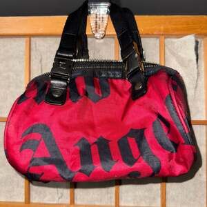 LESPORTSAC Red and Black ANGRY ANGEL Shoulder Bag